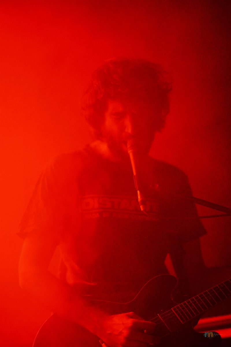 Candid by Viva Belgrado among red smoke