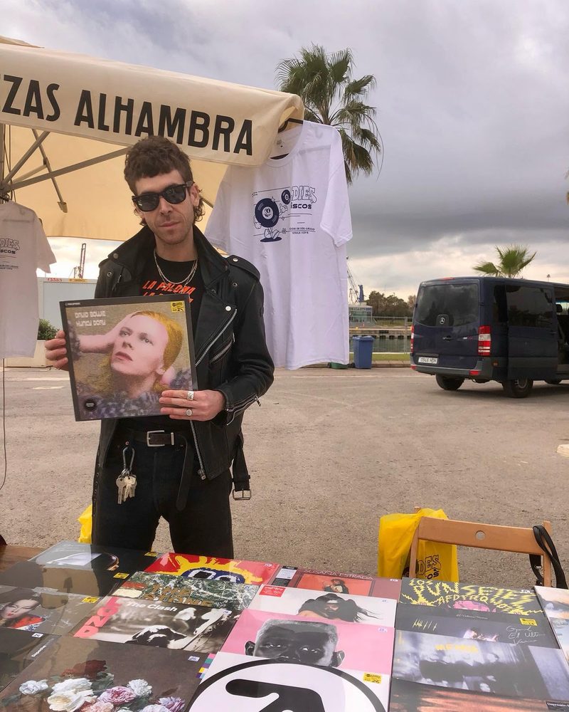 Outdoor Disco Oldies stand with vinyl and t-shirts