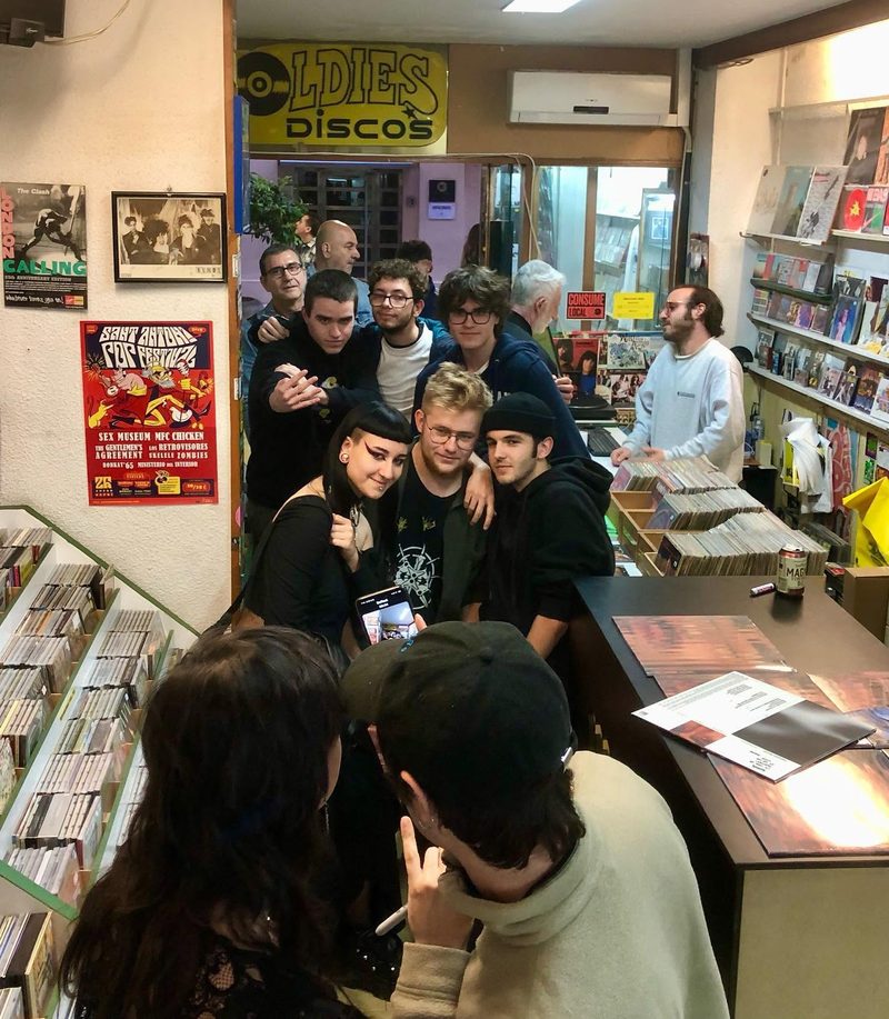 Group of people inside Disco Oldies during a musical meeting