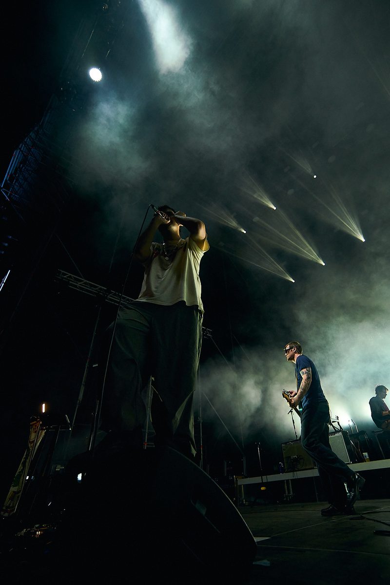 The singer and several Fontaines D.C. members perform amid haze and beams of light in Alicante, Spain.
